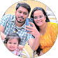 Family selfie showing parents and children smiling together, representing happiness and togetherness.